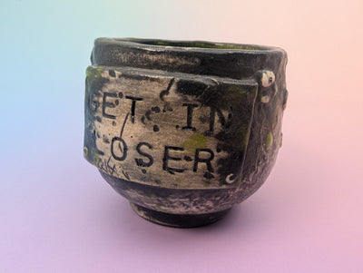 Get In Loser Handle-less Teacup - Cratered Black and Green with Floating Teal Inside
