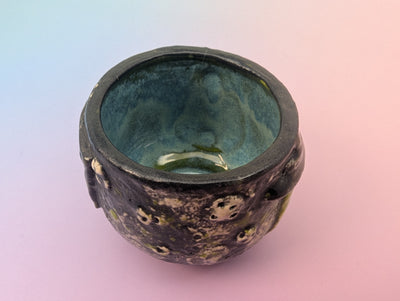 Get In Loser Handle-less Teacup - Cratered Black and Green with Floating Teal Inside